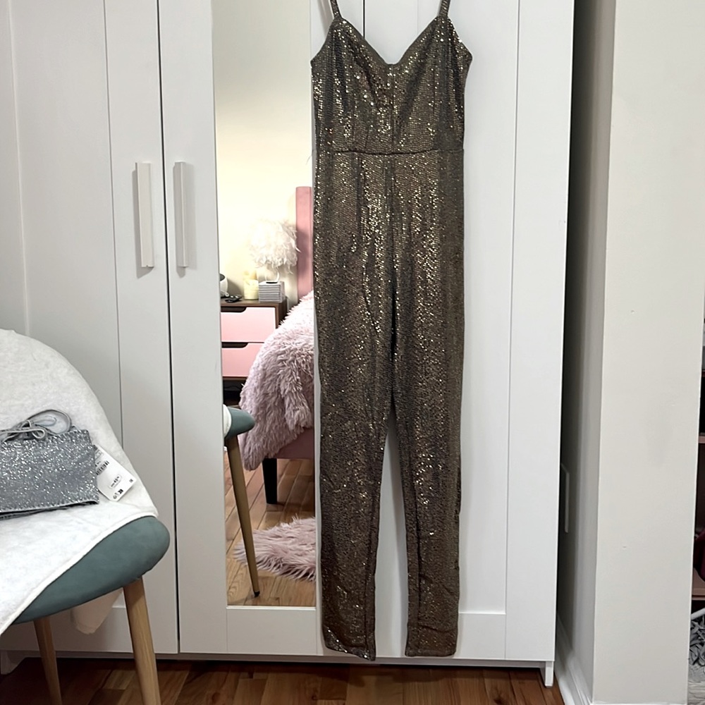 Blue s jump suit gold color
